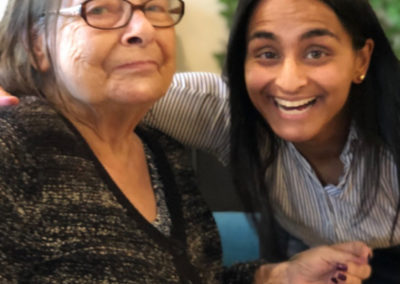 Bromley Park Care Home Manager and resident smiling at the camera
