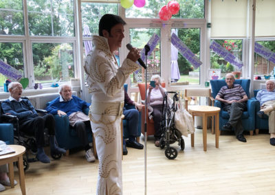Elvis tribute act performing at Bromley Park Care Home 1