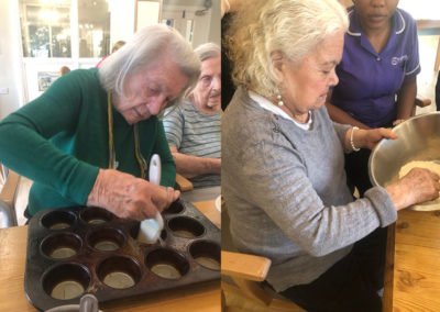 Bromley Park Care Home residents helping to grease cake tins and make the pastry for cherry pies