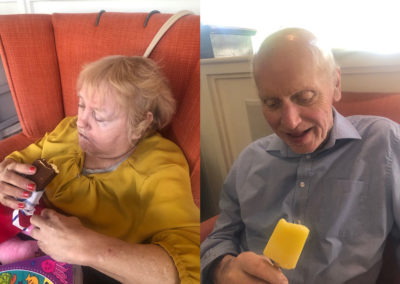 Two residents eating ice creams inside at Bromley Park Care Home