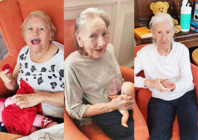 Three lady residents from Bromley Park smiling at the camera