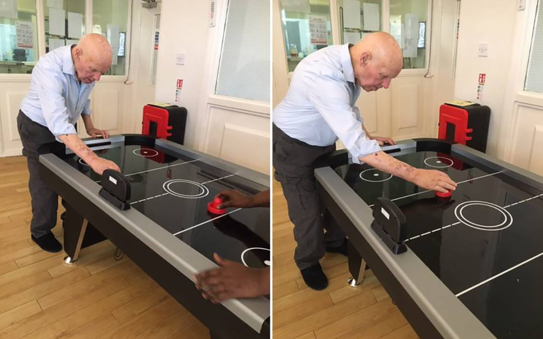 Bromley Park Care Home resident tests his air hockey skills