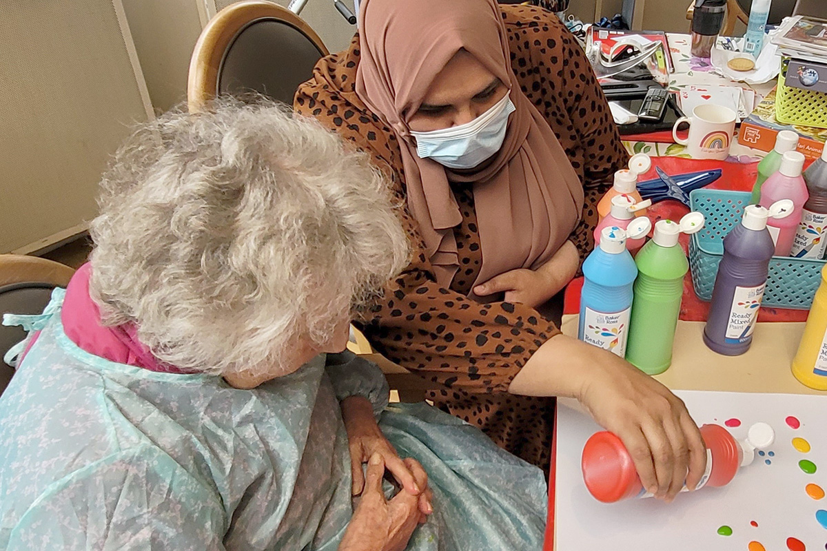 Painting and board games at Bromley Park Care Home