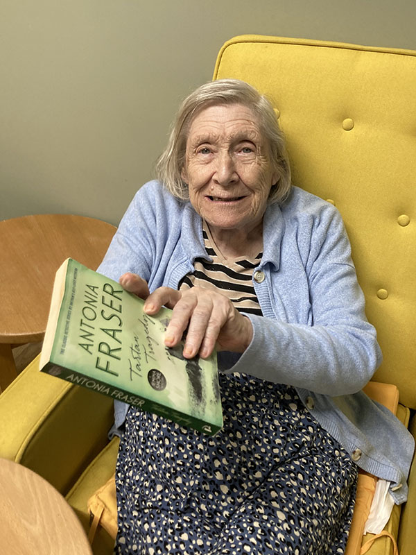 Resident enjoying a good book at Bromley Park Care Home